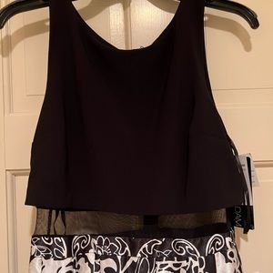 Gorgeous Betsy and Adam printed gown with sheer panel around waist.